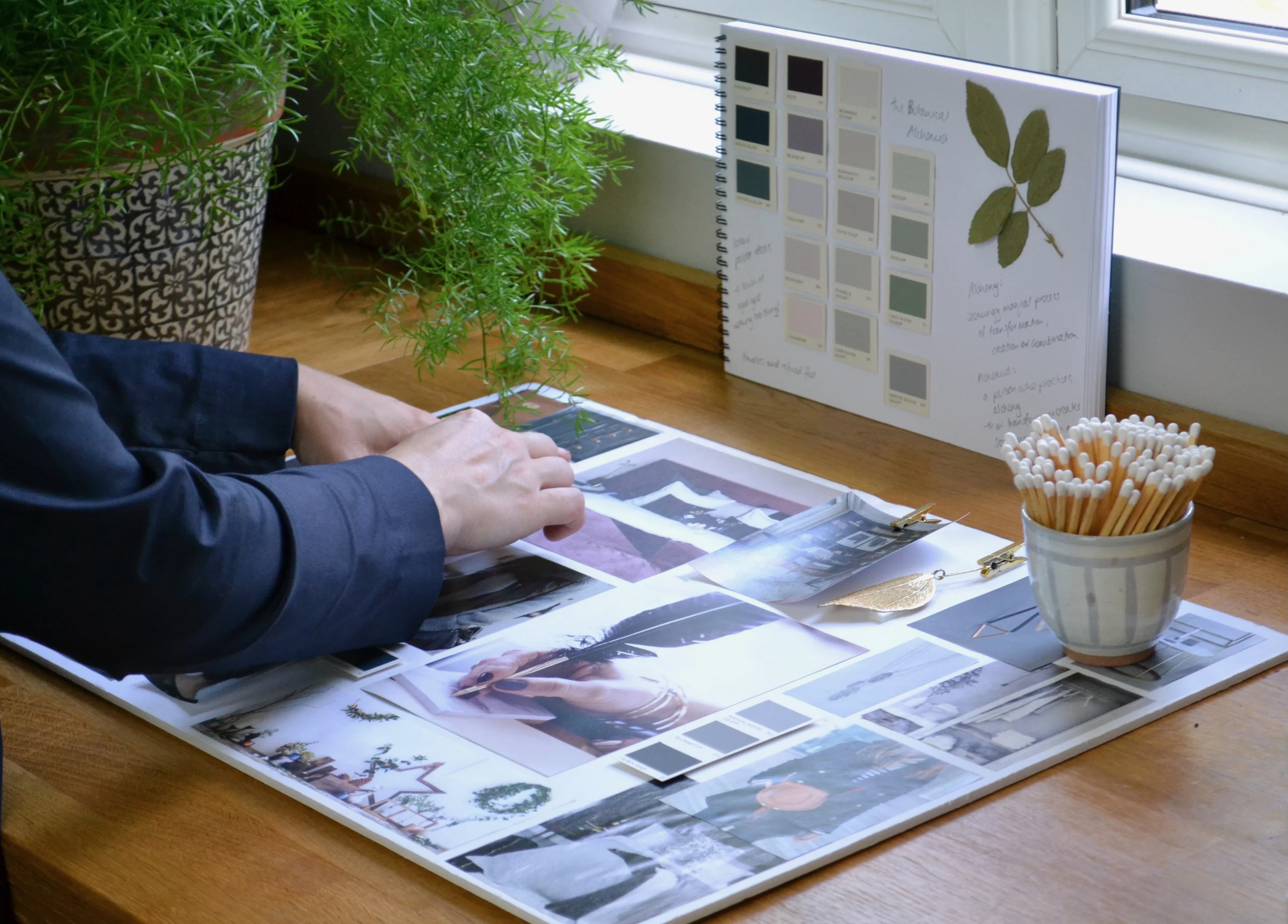 Agency project materials on a desk, illustrating a review of agency positioning
