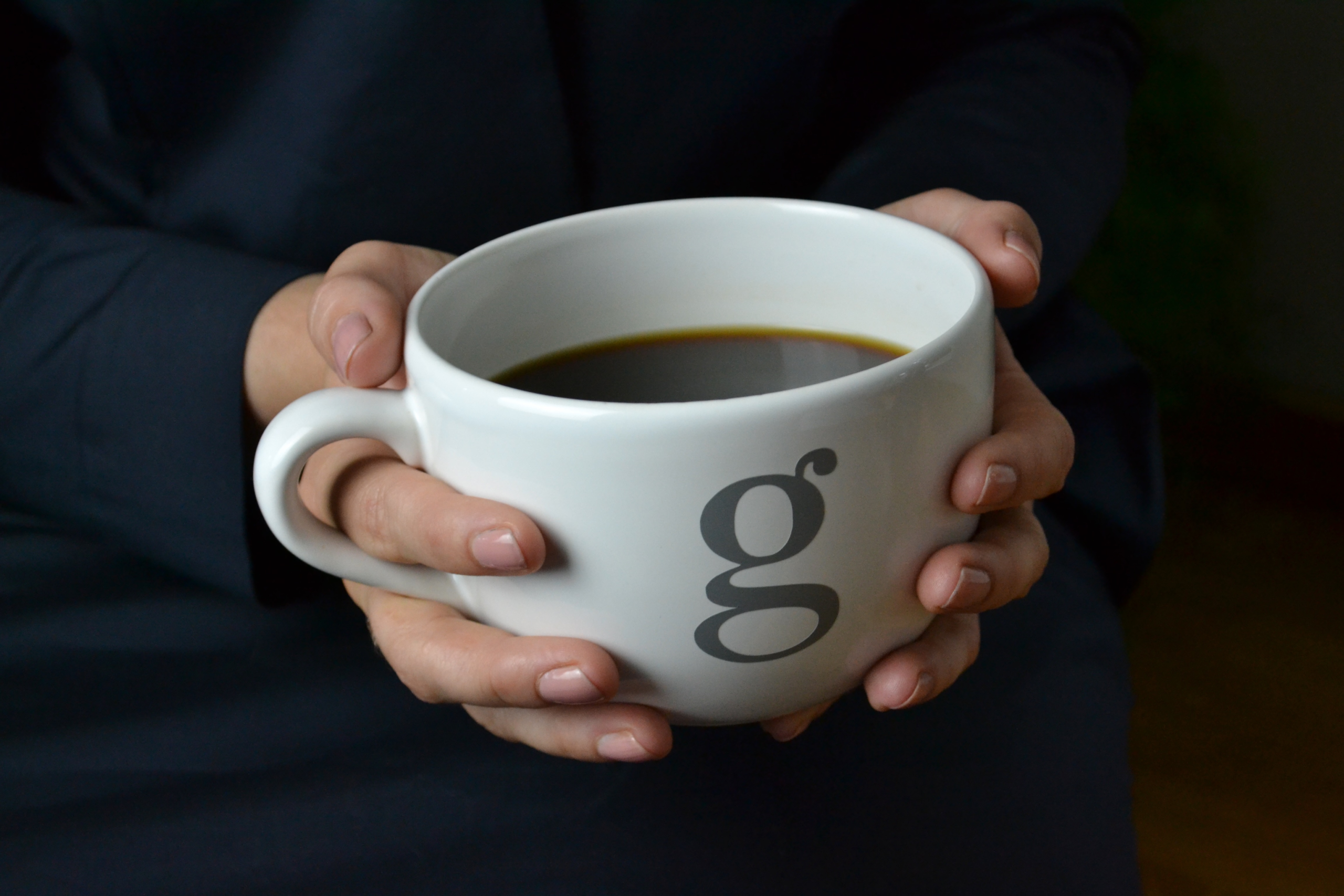 Kate holding a coffee cup, featured in an article about client concentration risk